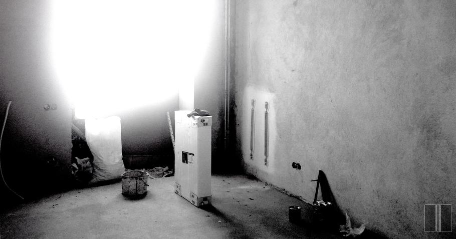 Už radiatoriaus nudažoma siena